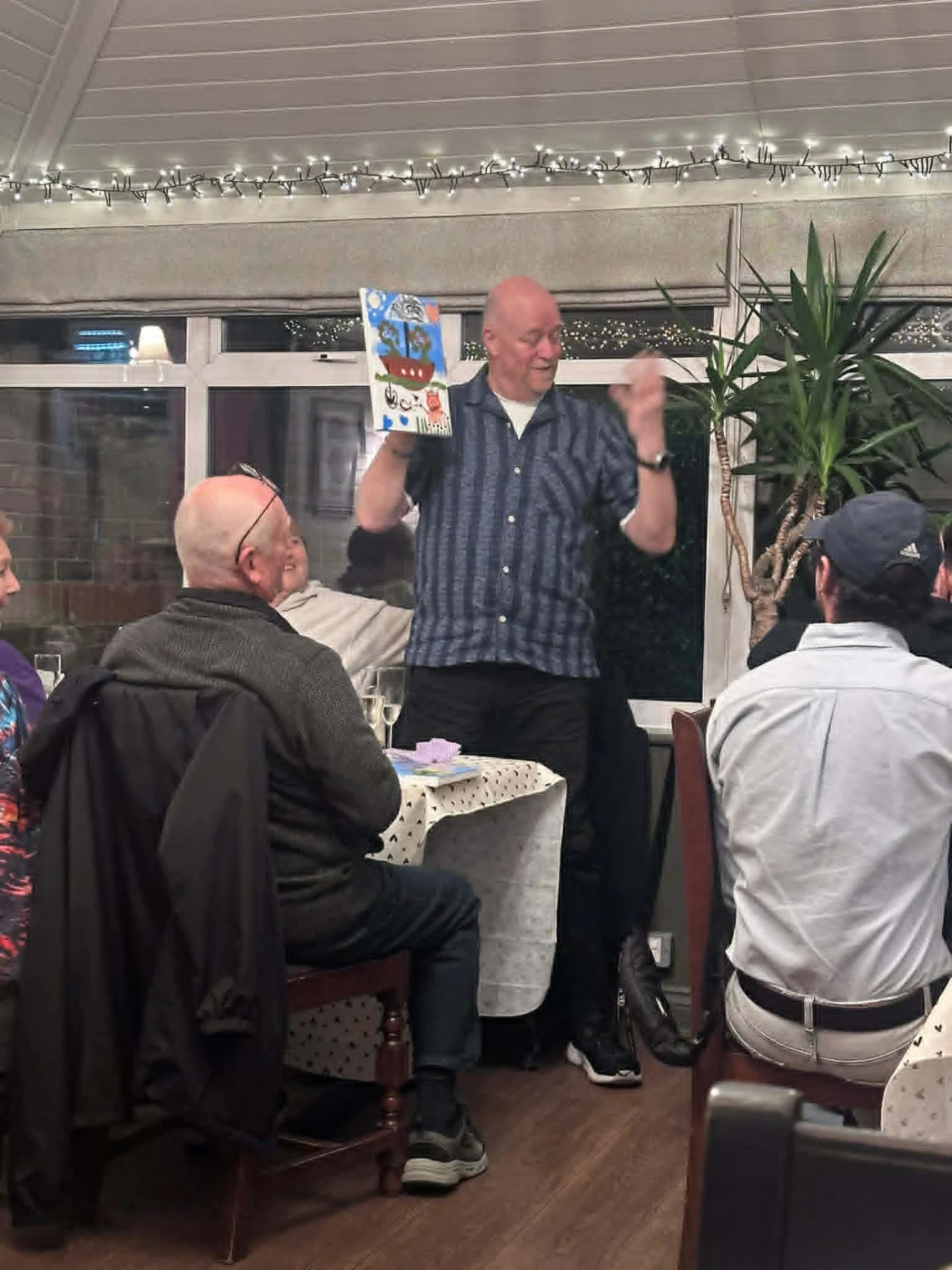 Guests enjoying an event in the conservatory